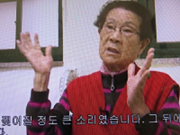 韓国語の字幕が付いた金日祚さんの映像